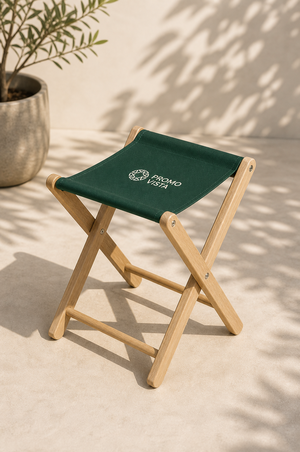 Custom printed wooden folding stool with green branded fabric