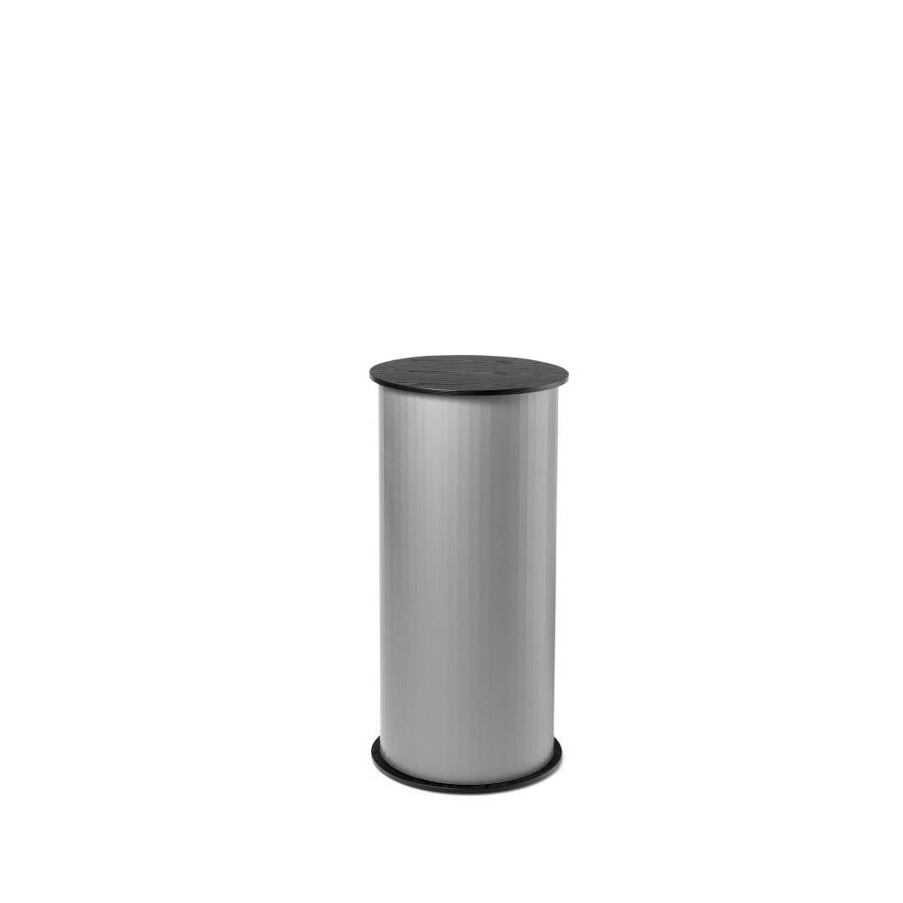 Unprinted round counter showing its compact cylindrical format