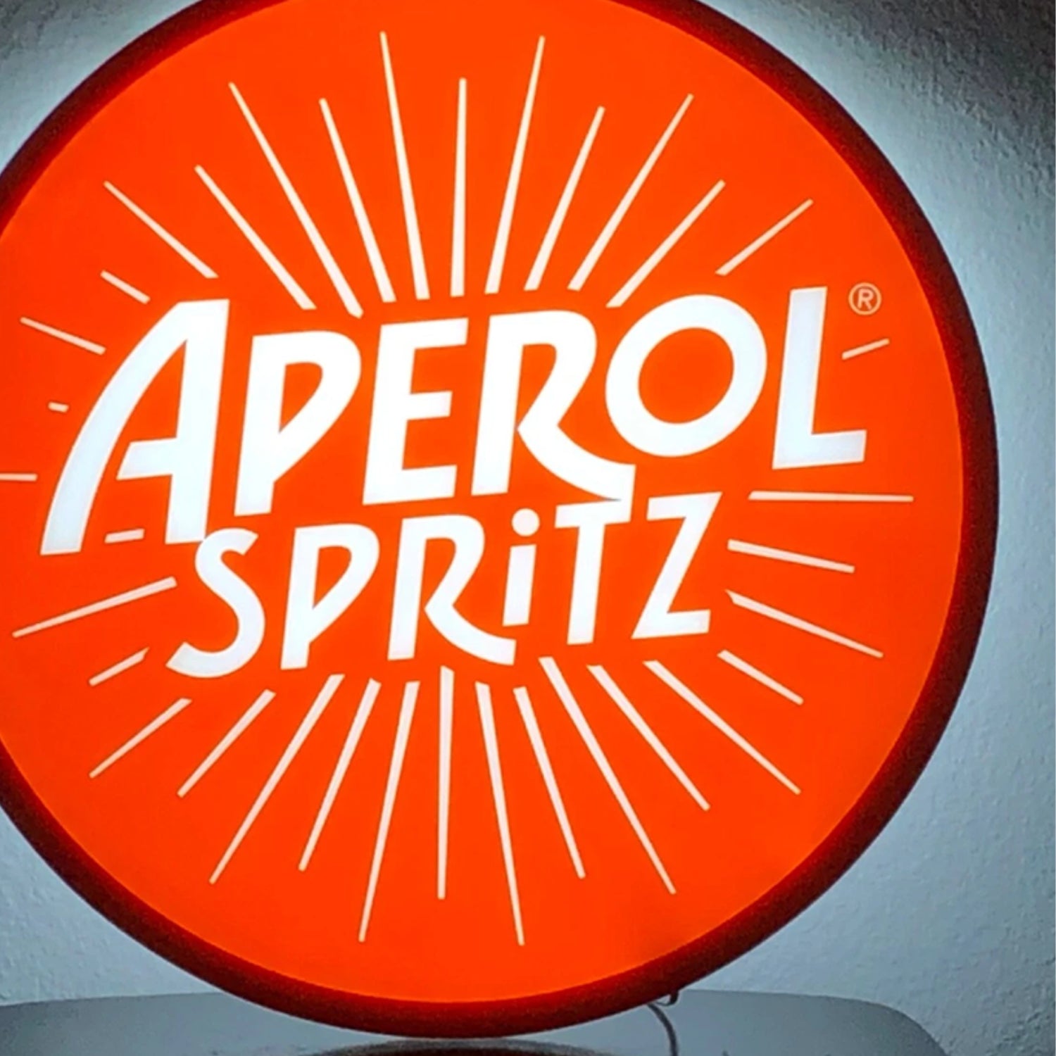 Ultra-thin round LED sign with bright illuminated logo