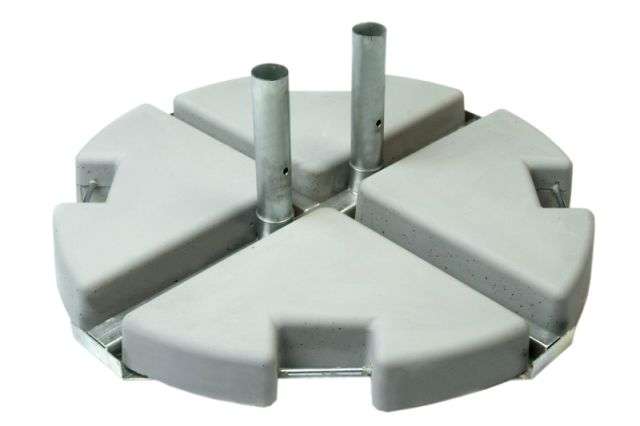 Matching metal cross base with rounded concrete weights for the RIO cantilever parasol