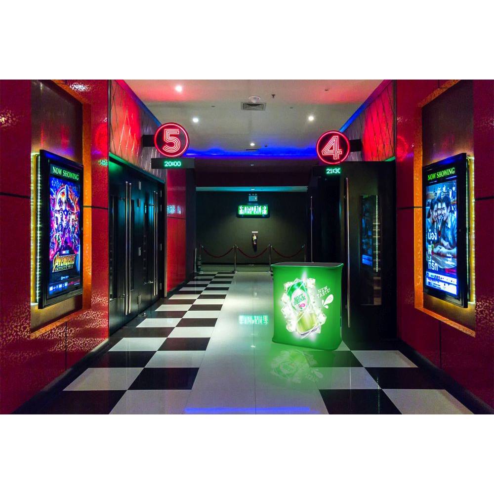 Illuminated pop-up fabric counter used at an indoor event