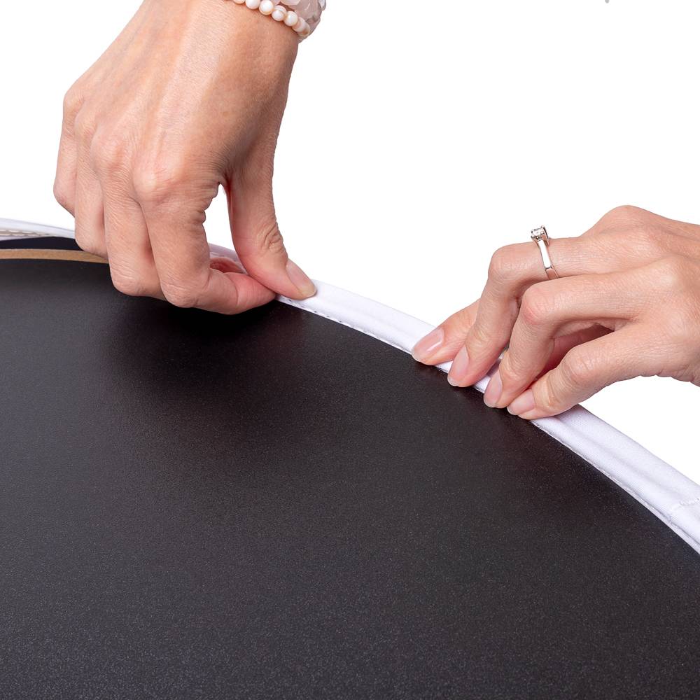 Fabric edge being inserted into the oval counter profile