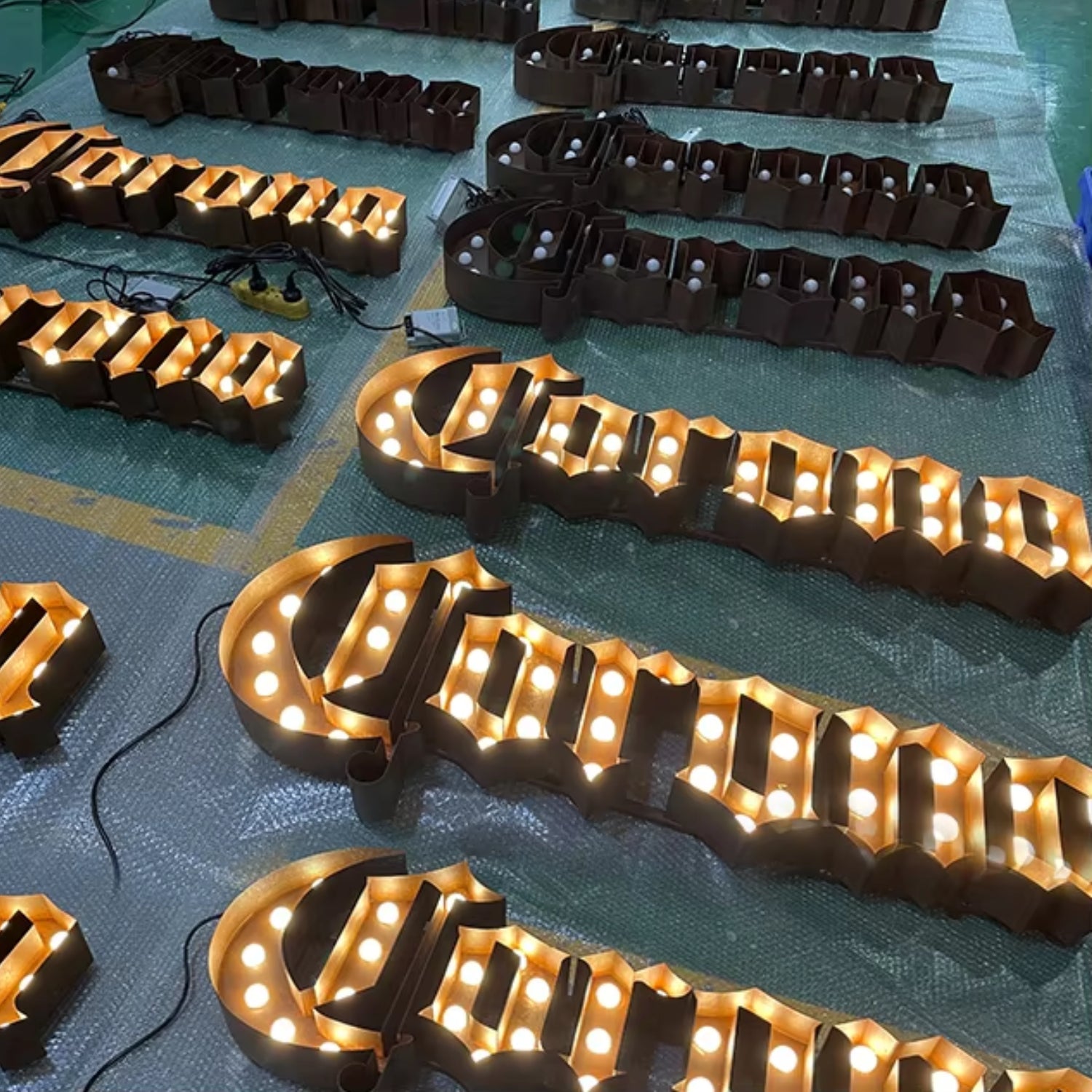 Marquee letter signs in production before dispatch